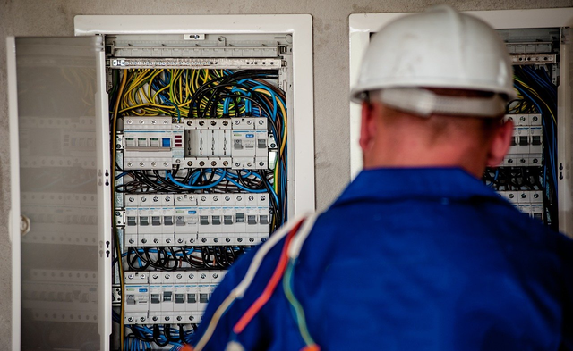 guy fixing electricity